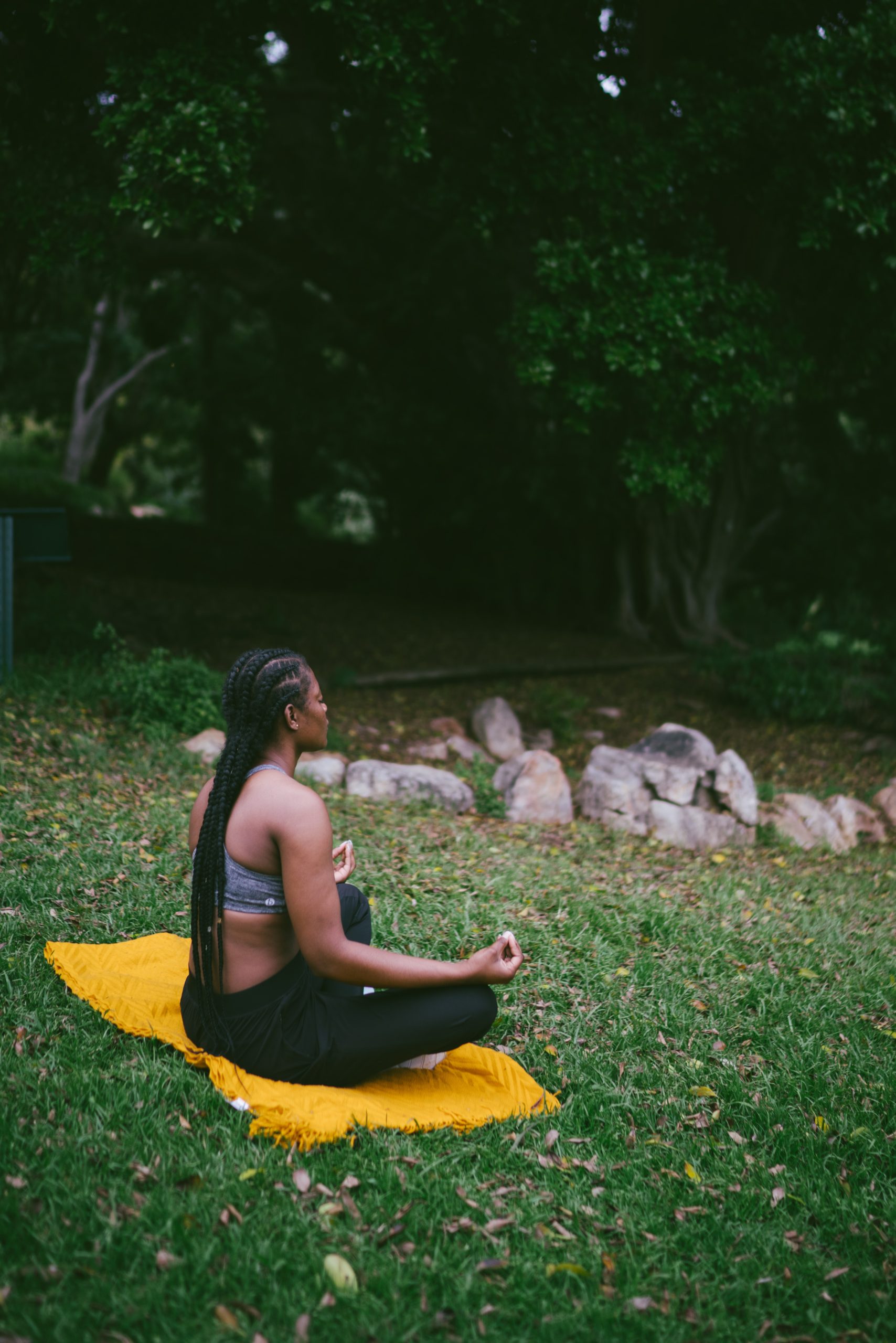 woman meditating outdoors