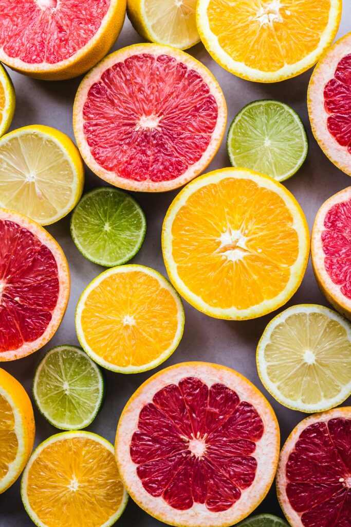 various cut citrus fruits