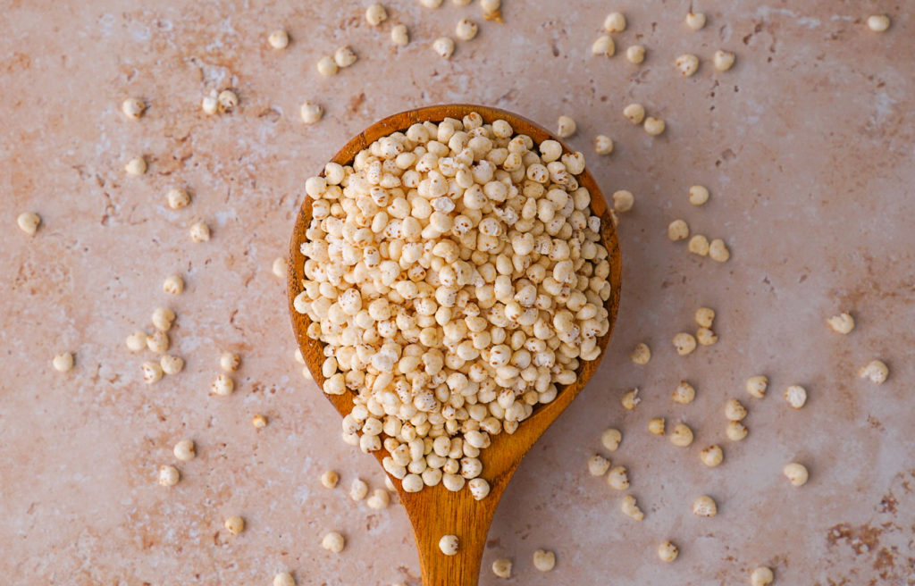 healthiest grains millet grain on spoon